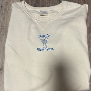 Cream crewneck with Blue Graphic